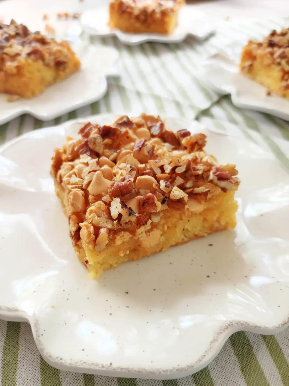 Delicious Butterscotch Crunch Cake Bars topped with a crunchy layer